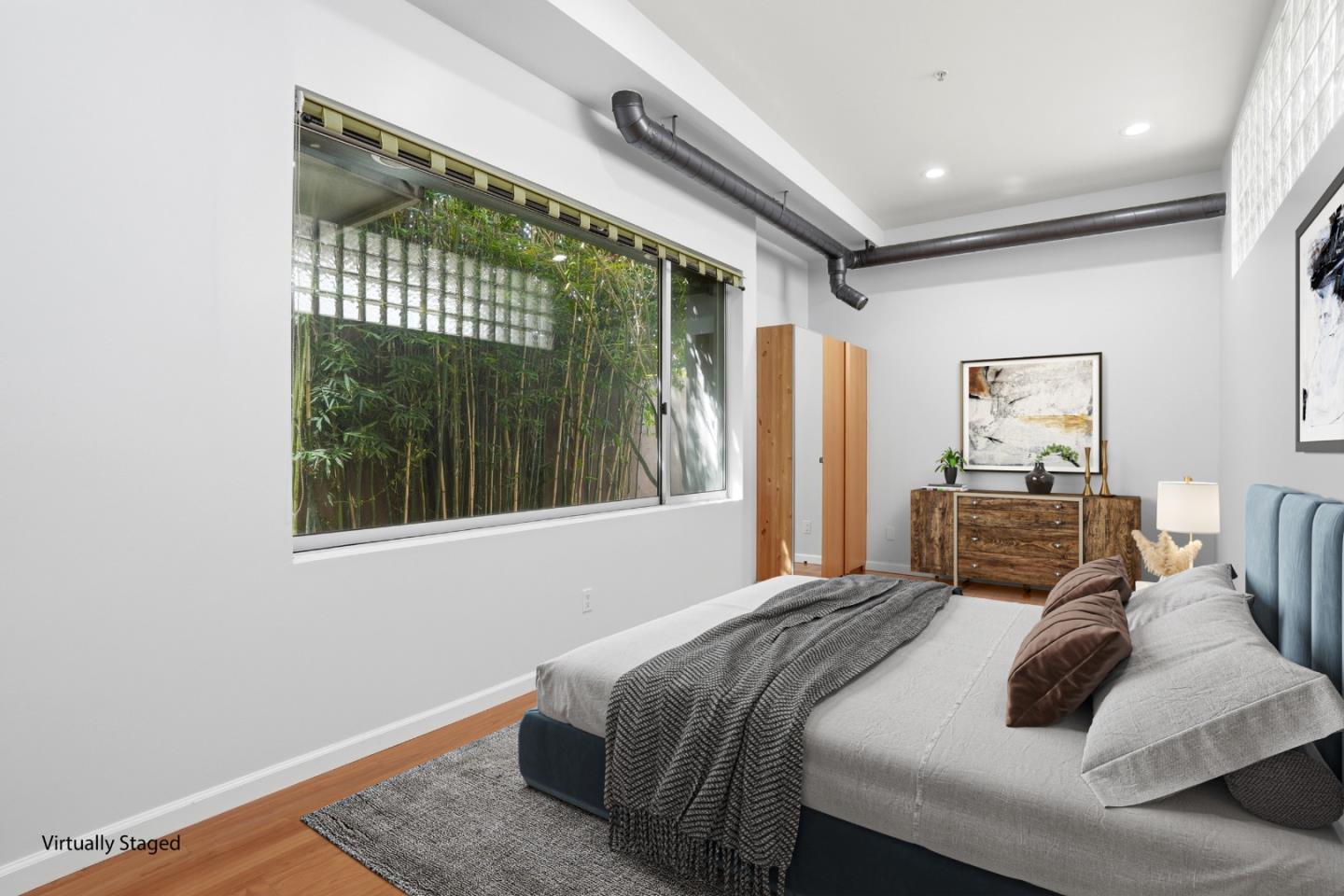2709 Tenth Street, Unit C Berkeley, CA 94710 - Photo 14 of 44 a bedroom with a bed and a window