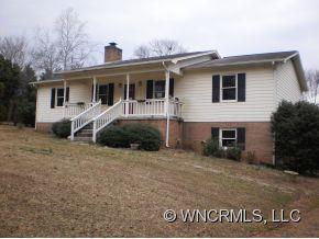 147 Stewart Street Rutherfordton, NC 28139 - Photo 5 of 6 a front view of a house with a yard