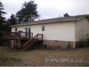 147 Stewart Street Rutherfordton, NC 28139 - Photo 6 of 6 a view of a house with a yard