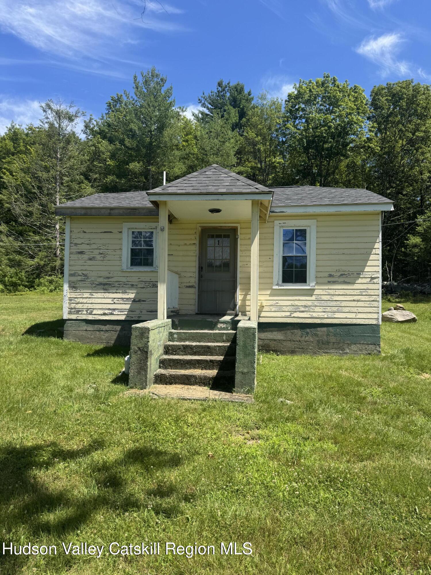 66-84 Katzman Road Ellenville, NY 12428 - Photo 24 of 30 a view of a house with a yard