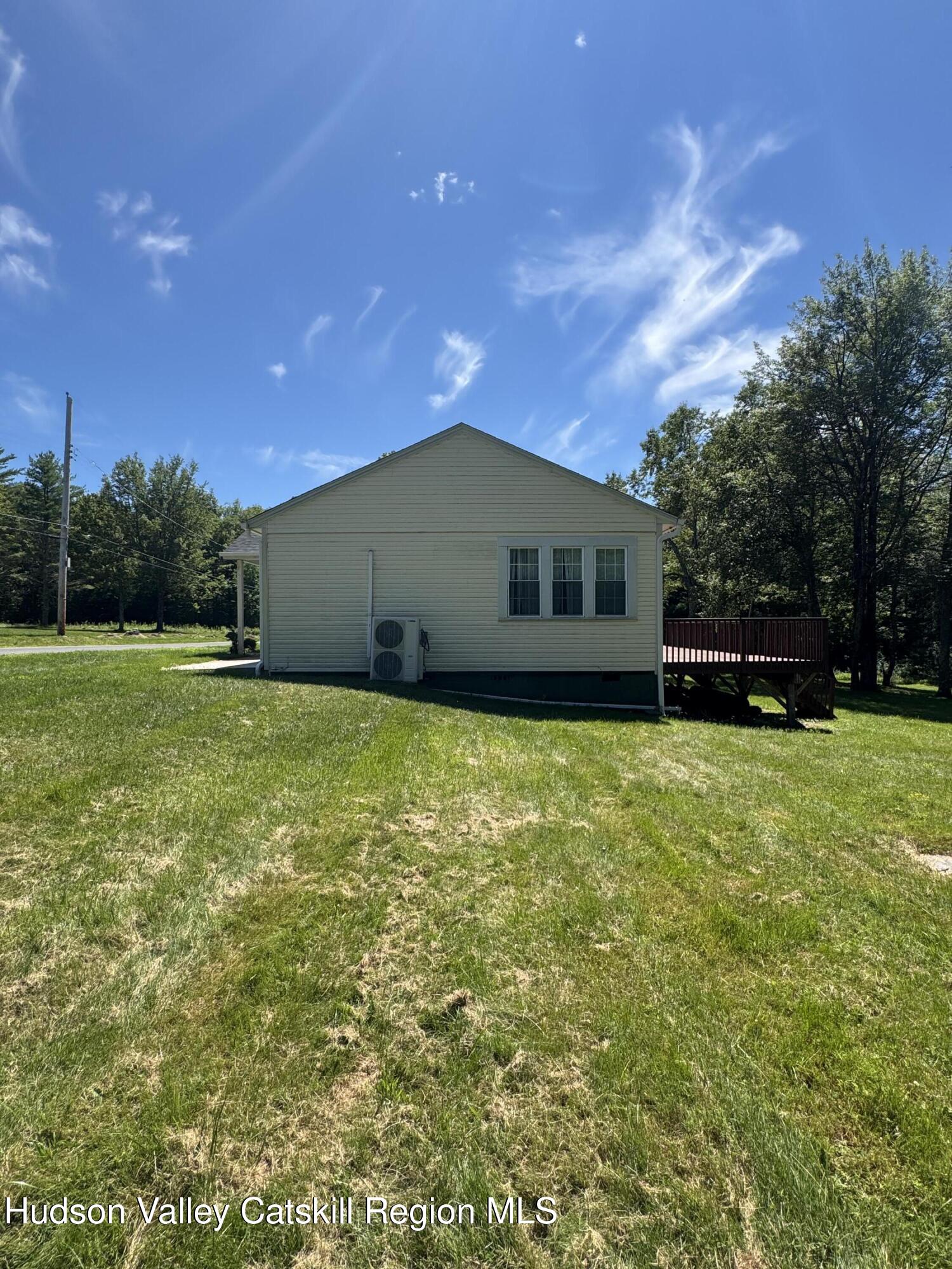 66-84 Katzman Road Ellenville, NY 12428 - Photo 4 of 30 a view of a house with a backyard