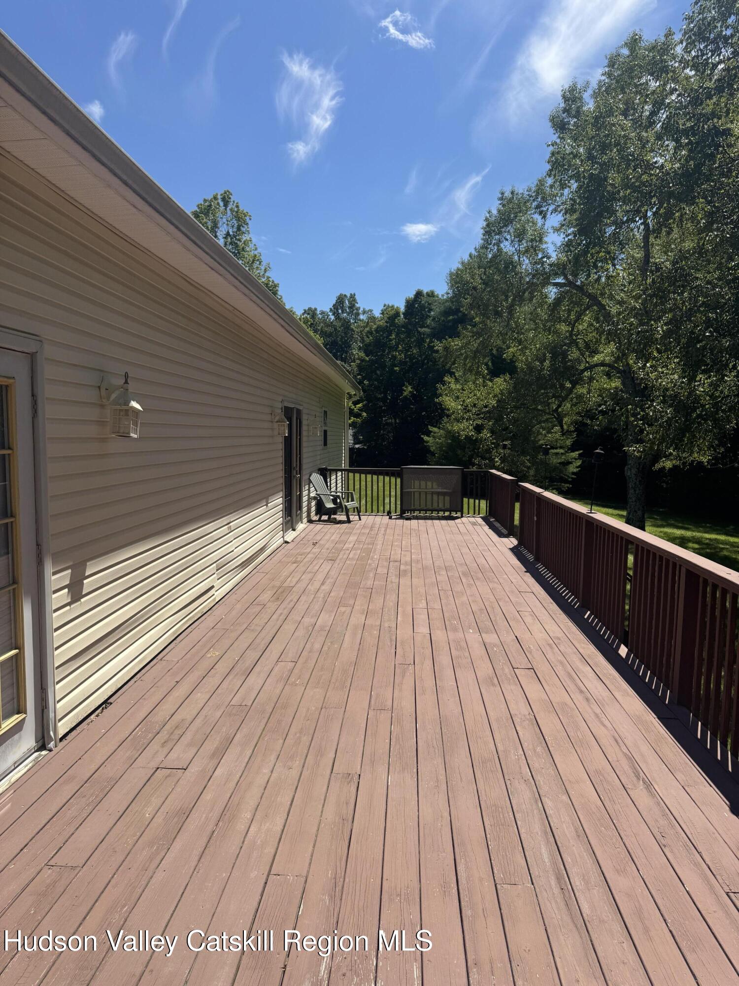 66-84 Katzman Road Ellenville, NY 12428 - Photo 7 of 30 a view of a wooden deck with a yard