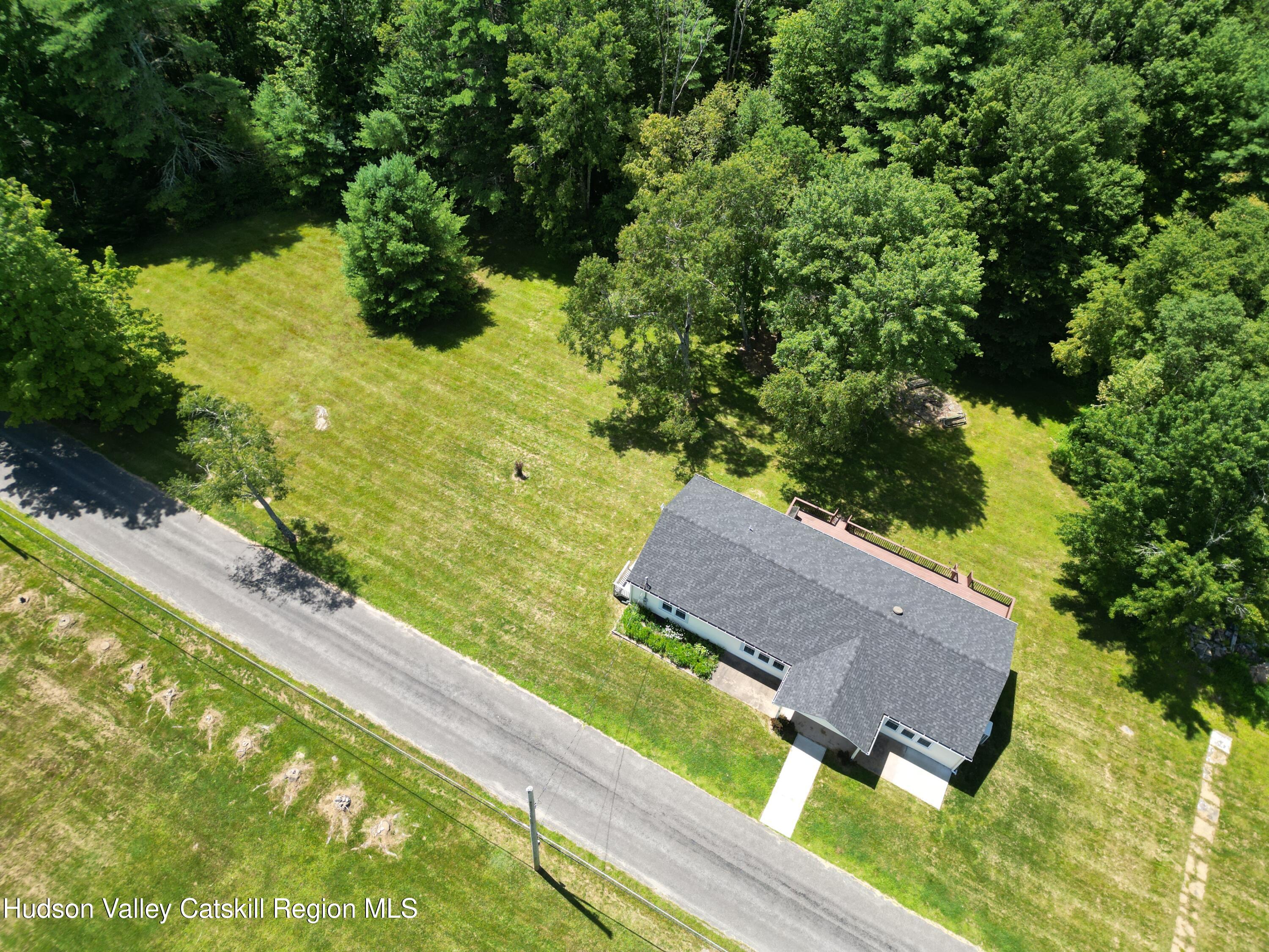 66-84 Katzman Road Ellenville, NY 12428 - Photo 10 of 30 a view of a house with a yard