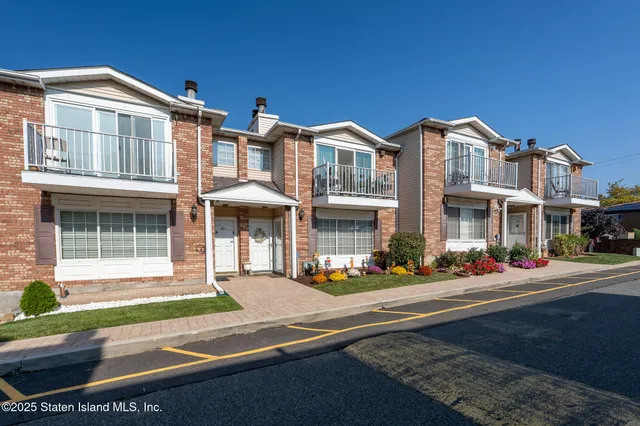 a front view of a building with street view