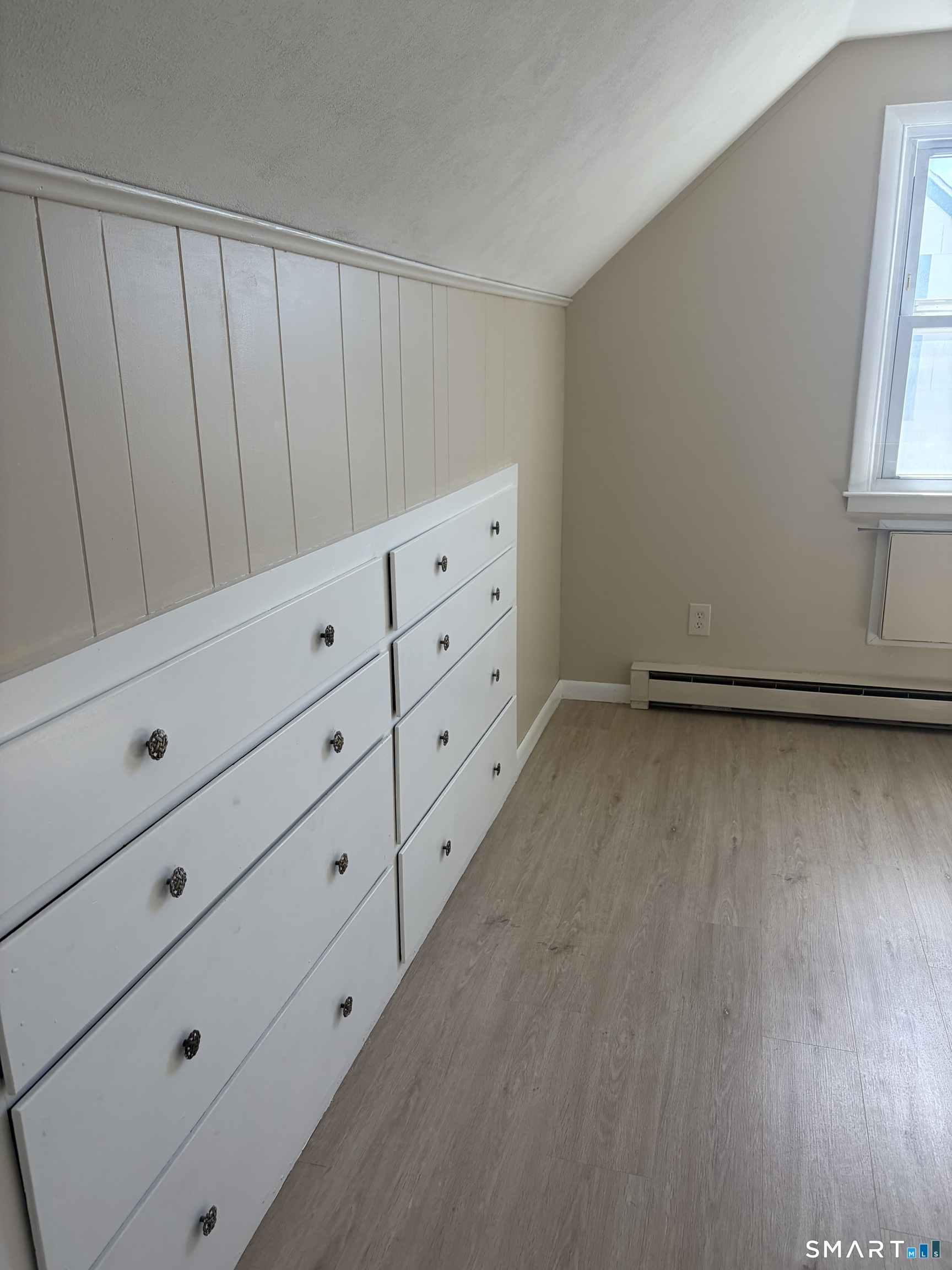 123 Longview Avenue Fairfield, CT 06824 - Photo 16 of 23 a view of an empty walk in closet