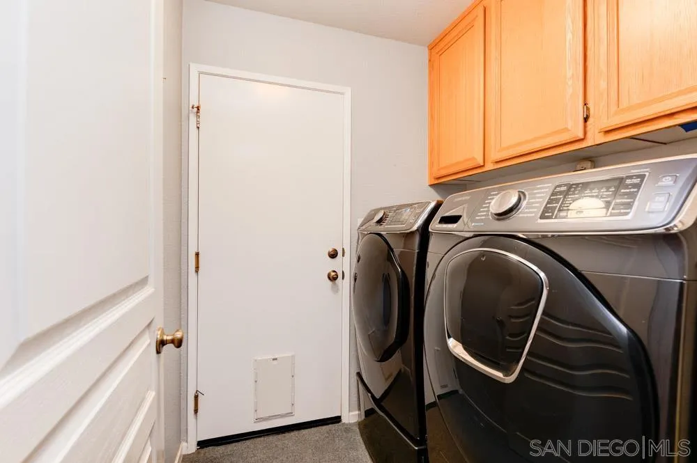 10205 Pinon Place Lakeside, CA 92040 - Photo 17 of 23 a utility room with dryer and washer