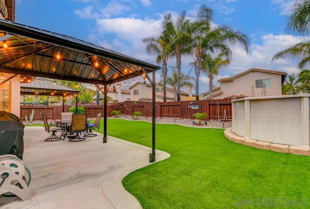 10205 Pinon Place Lakeside, CA 92040 - Photo 21 of 23 a view of a backyard with a patio