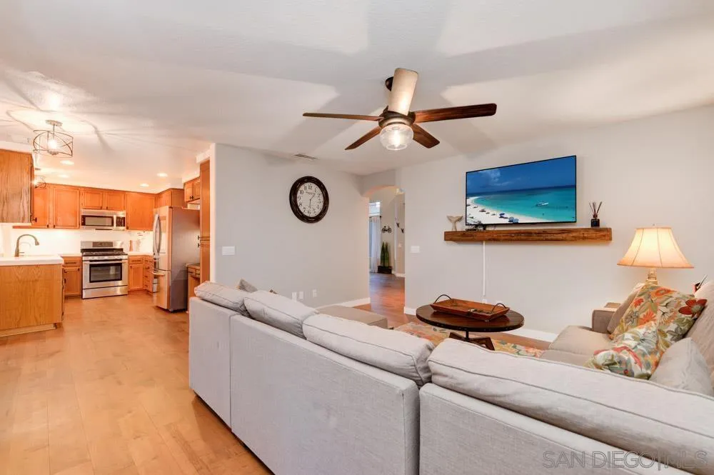 10205 Pinon Place Lakeside, CA 92040 - Photo 6 of 23 a living room with furniture and a clock