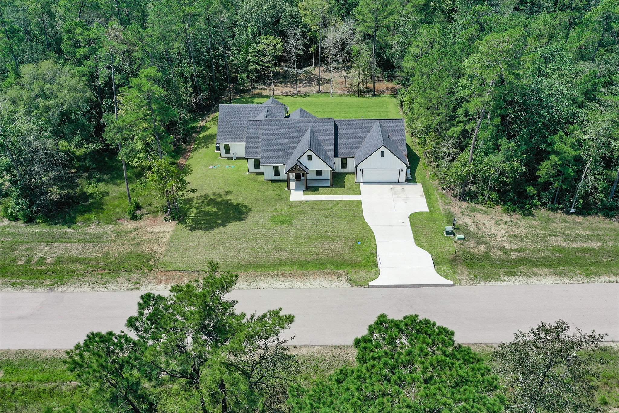 111 Eagle Run Road Willis, TX 77378 - Photo 4 of 44 Located in Deer Forest Subdivision - secluded, yet good proximity to amenities
