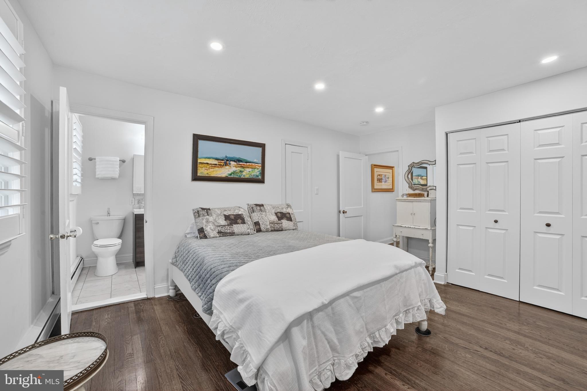 305 Irish Road Berwyn, PA 19312 - Photo 18 of 34 a spacious bedroom with a bed and a view of bathroom