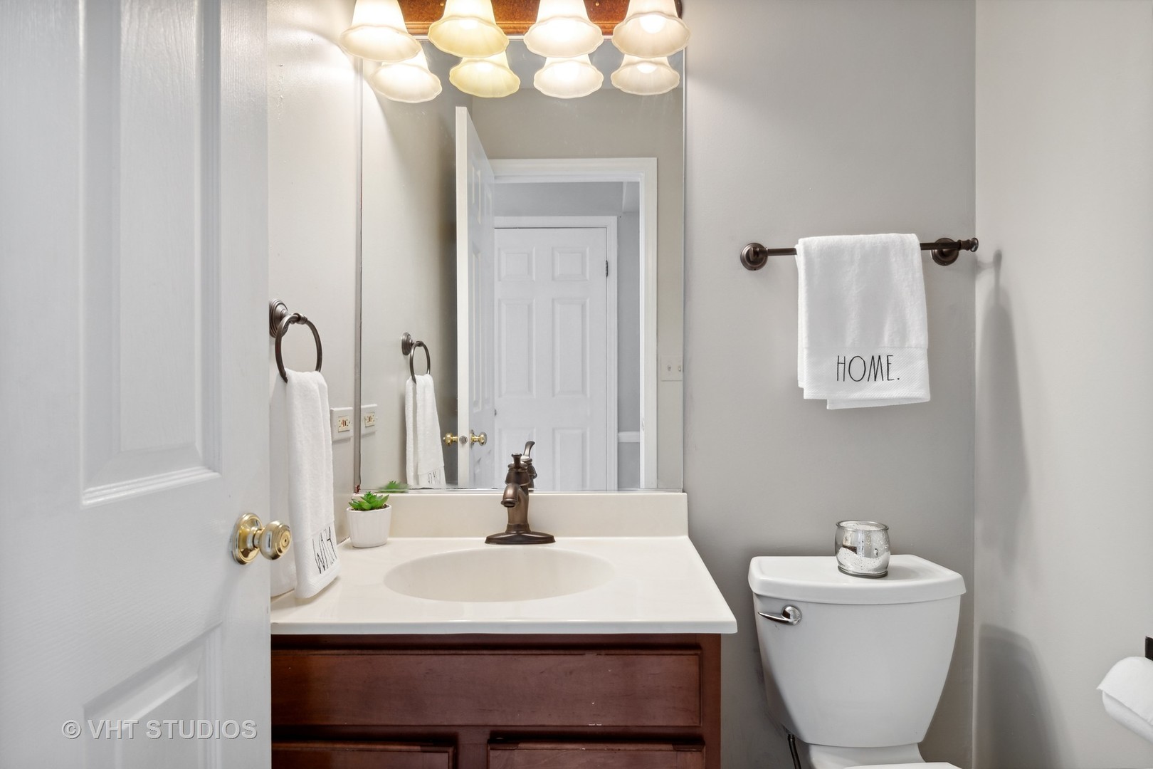 2780 Carriage Way Aurora, IL 60504 - Photo 18 of 19 a bathroom with a sink and a mirror