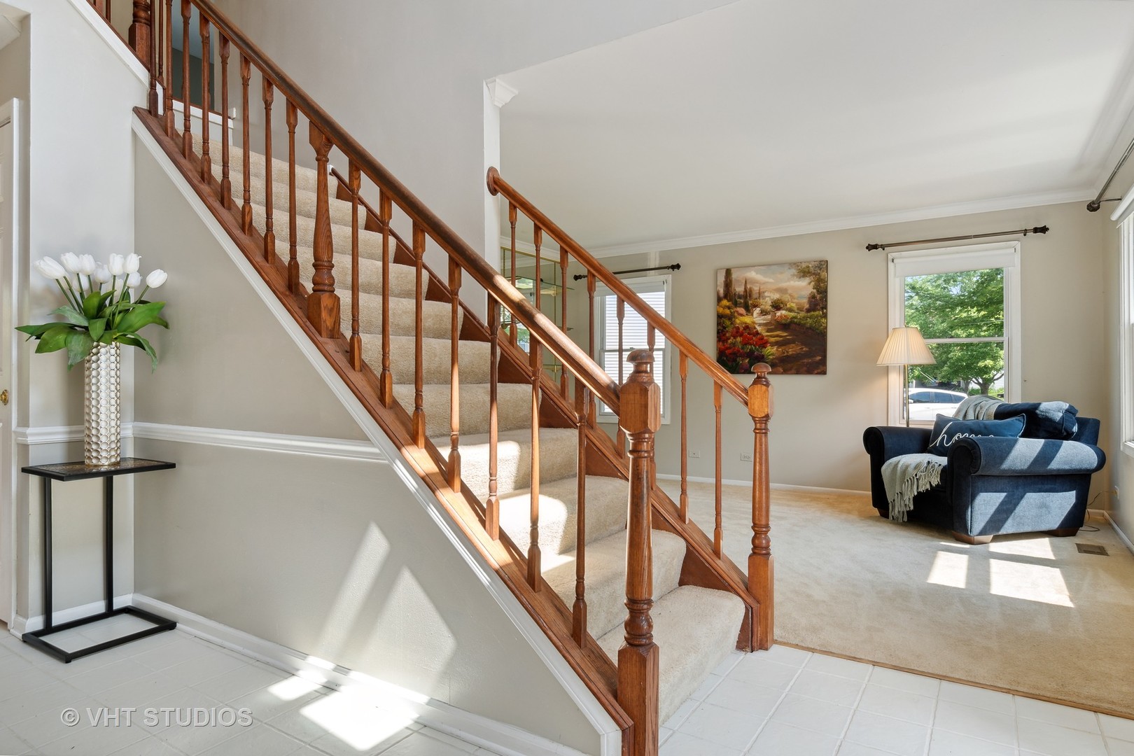 2780 Carriage Way Aurora, IL 60504 - Photo 3 of 19 a living room with furniture and stairs