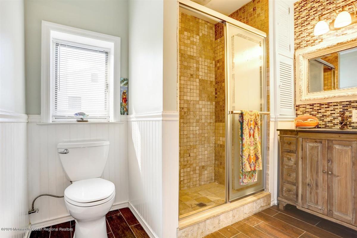 2510 Scott Road Wall, NJ 07719 - Photo 14 of 35 a bathroom with a toilet and a shower