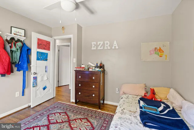 a kitchen with granite countertop wooden cabinets stainless steel appliances and a counter space