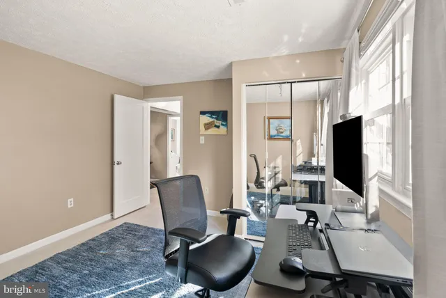 a patio with table and chairs