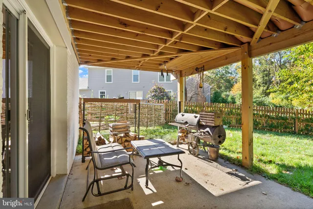 a view of a lake with outdoor seating