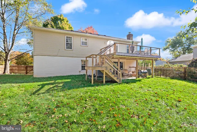 a view of a lake with houses in the background