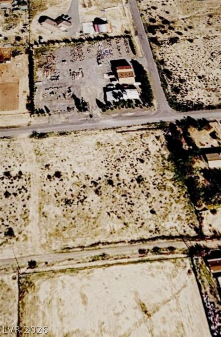 281 West Stagecoach Road Pahrump, NV 89060 - Photo 5 of 5 A bird's-eye view reveals a sprawling land parcel offering vast development potential.