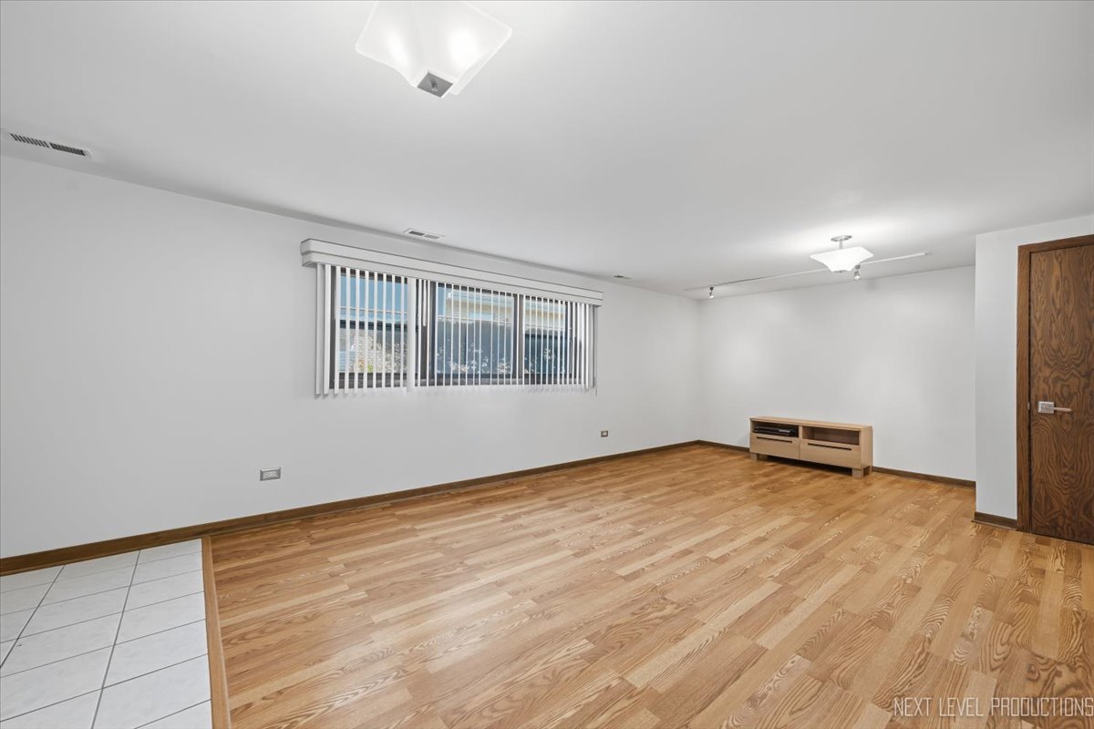754 North Michigan Street Elmhurst, IL 60126 - Photo 22 of 32 a view of an empty room with a window