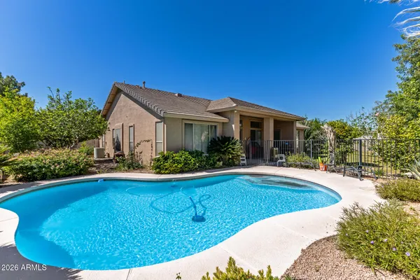 a view of pool with outdoor seating