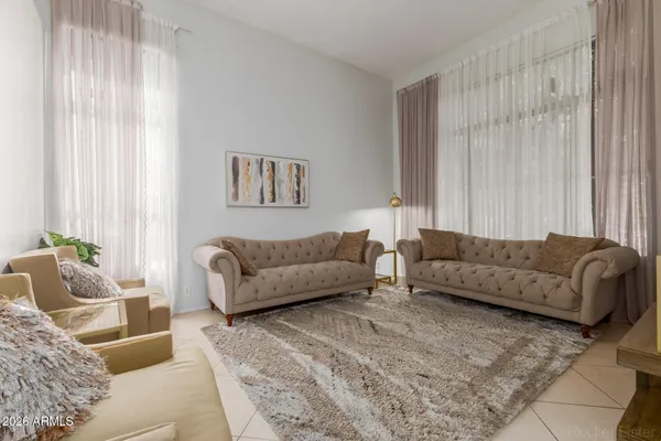 a living room with furniture and a couch