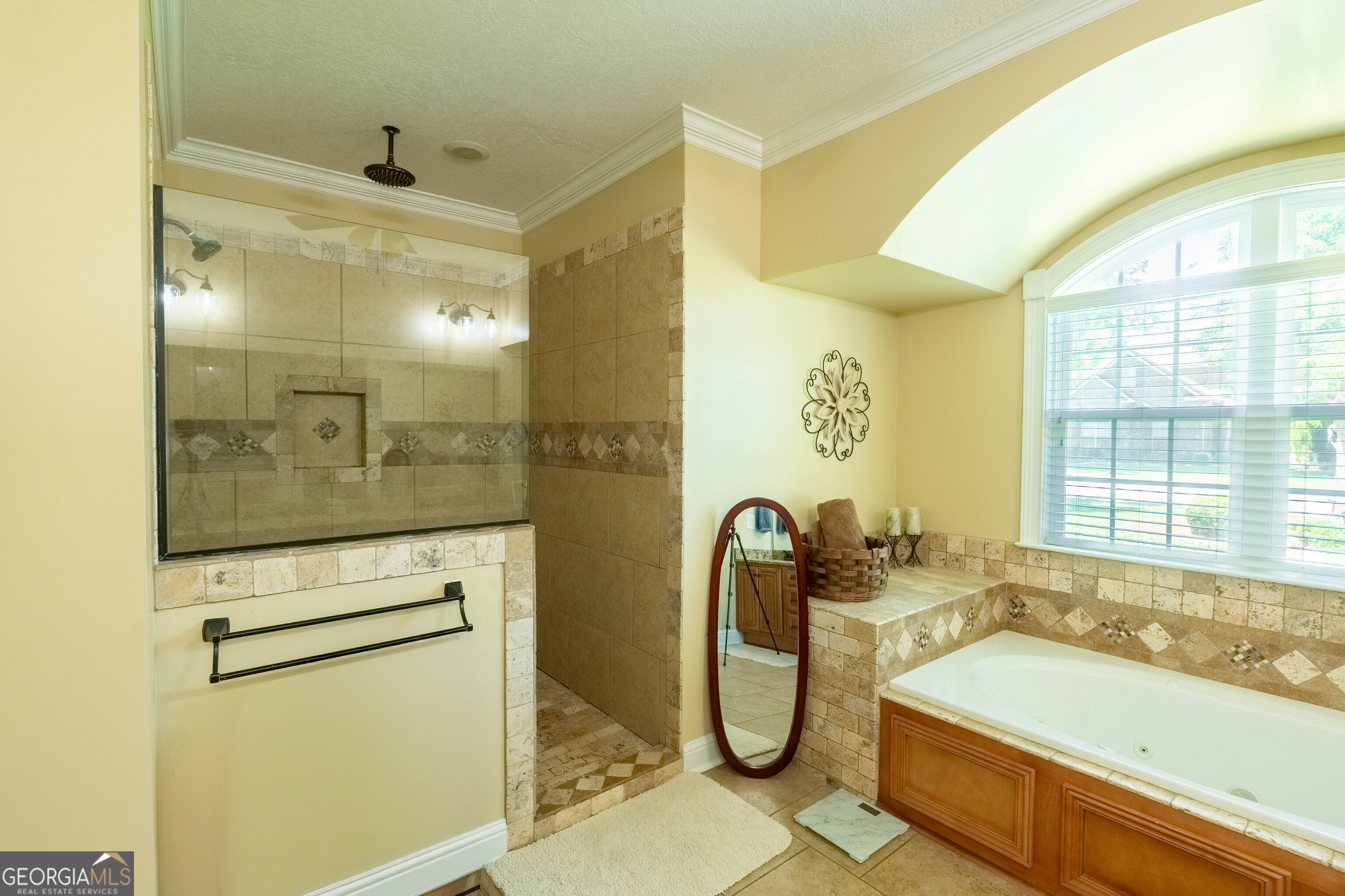 501 Old Bridge Road Warner Robins, GA 31088 - Photo 42 of 54 a bathroom with a tub a sink and a shower