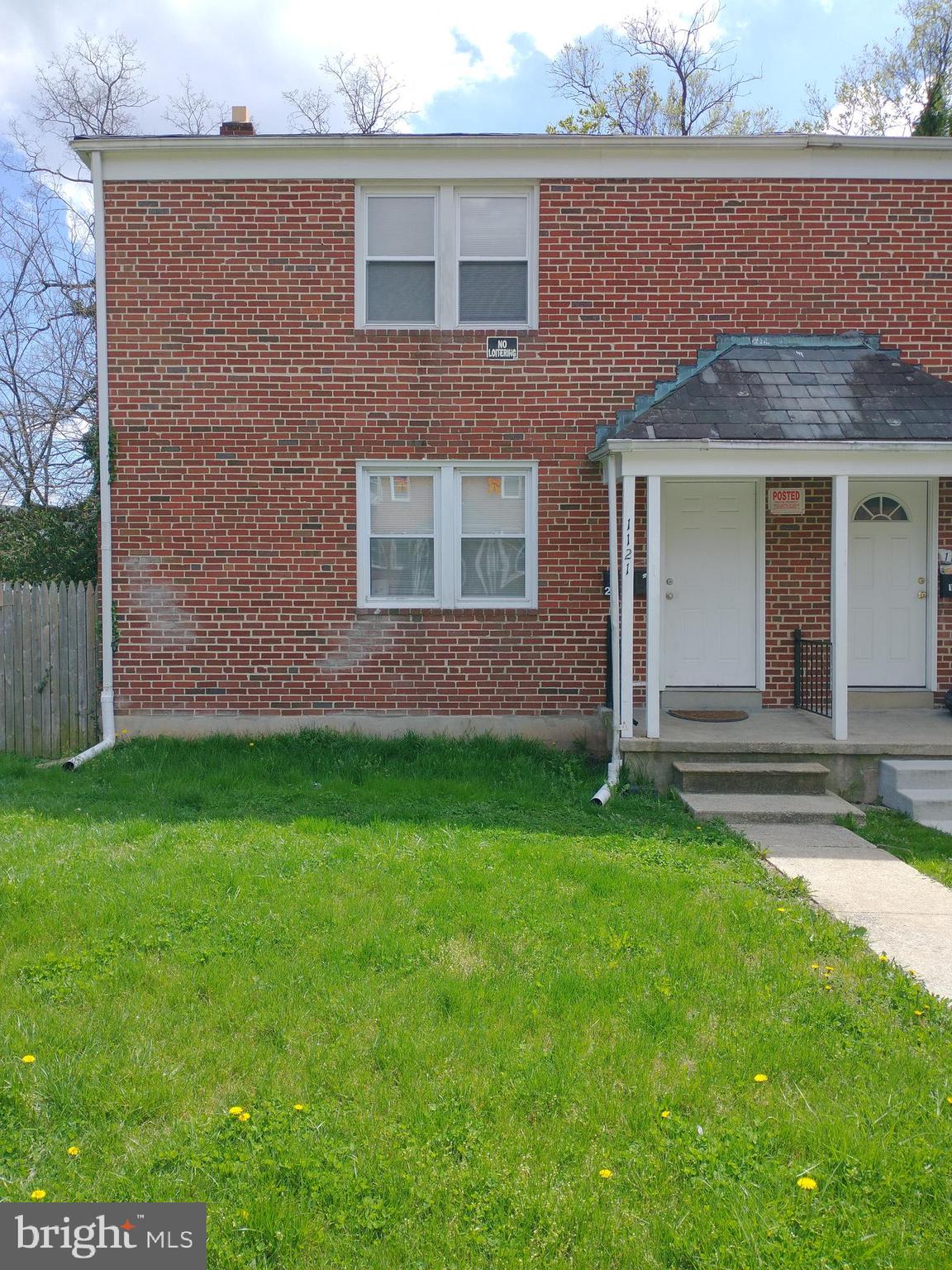 1121 Gleneagle Road Baltimore, MD 21239 - Photo 1 of 17 a view of front of a house with a yard
