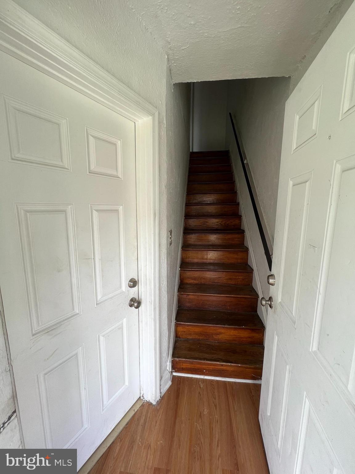 1121 Gleneagle Road Baltimore, MD 21239 - Photo 15 of 17 a view of entryway with wooden floor