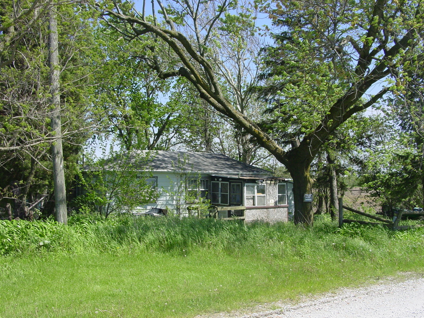 27461 South Scheer Road Manhattan, IL 60442 - Photo 2 of 7 a front view of a house with a yard