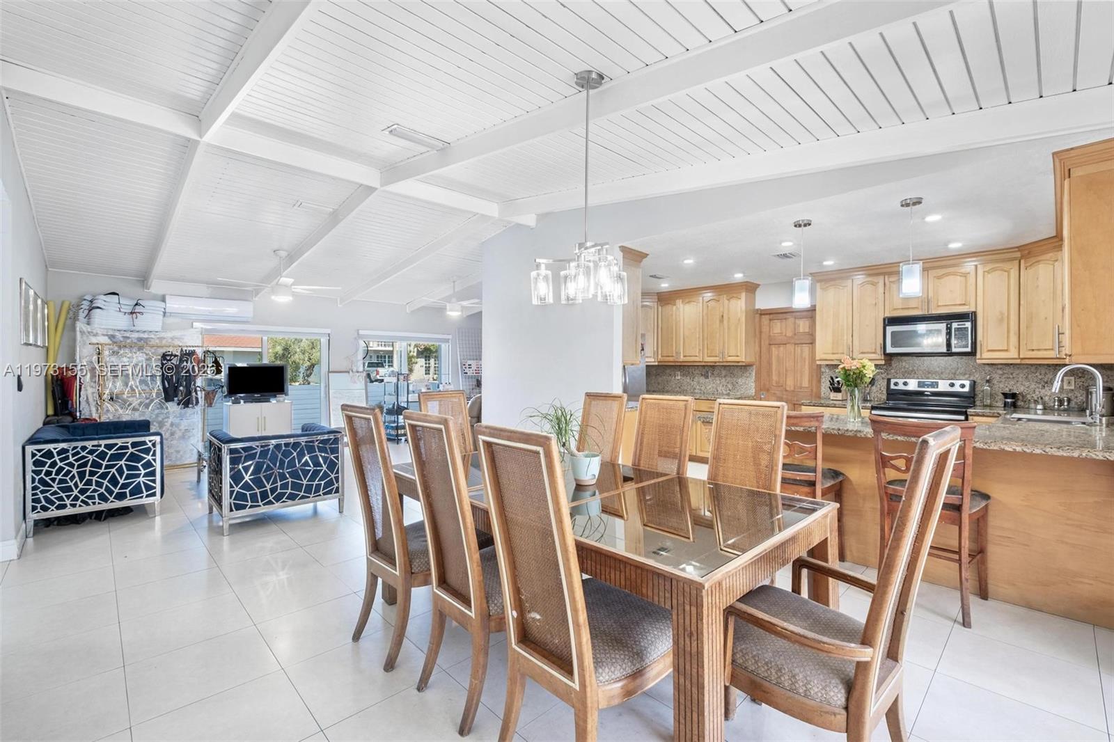 13710 Southwest 18th Terrace Miami, FL 33175 - Photo 11 of 46 a view of a dining room with furniture