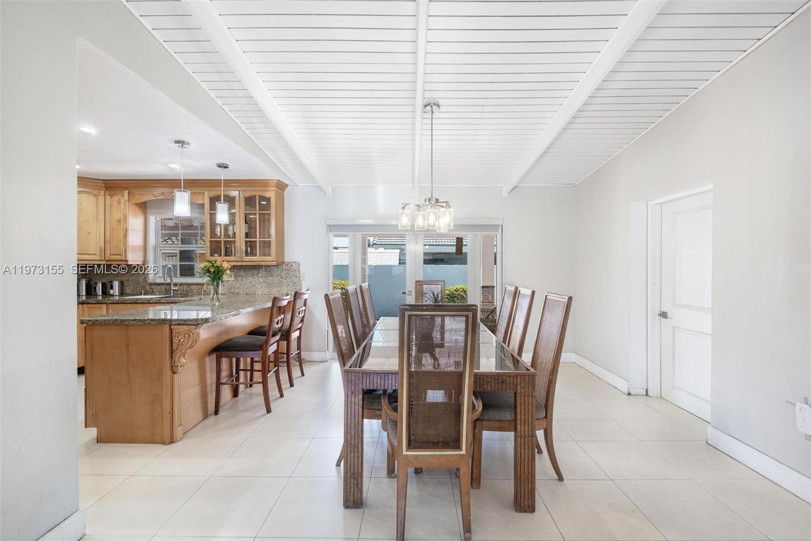 13710 Southwest 18th Terrace Miami, FL 33175 - Photo 12 of 46 a dining room with furniture and window
