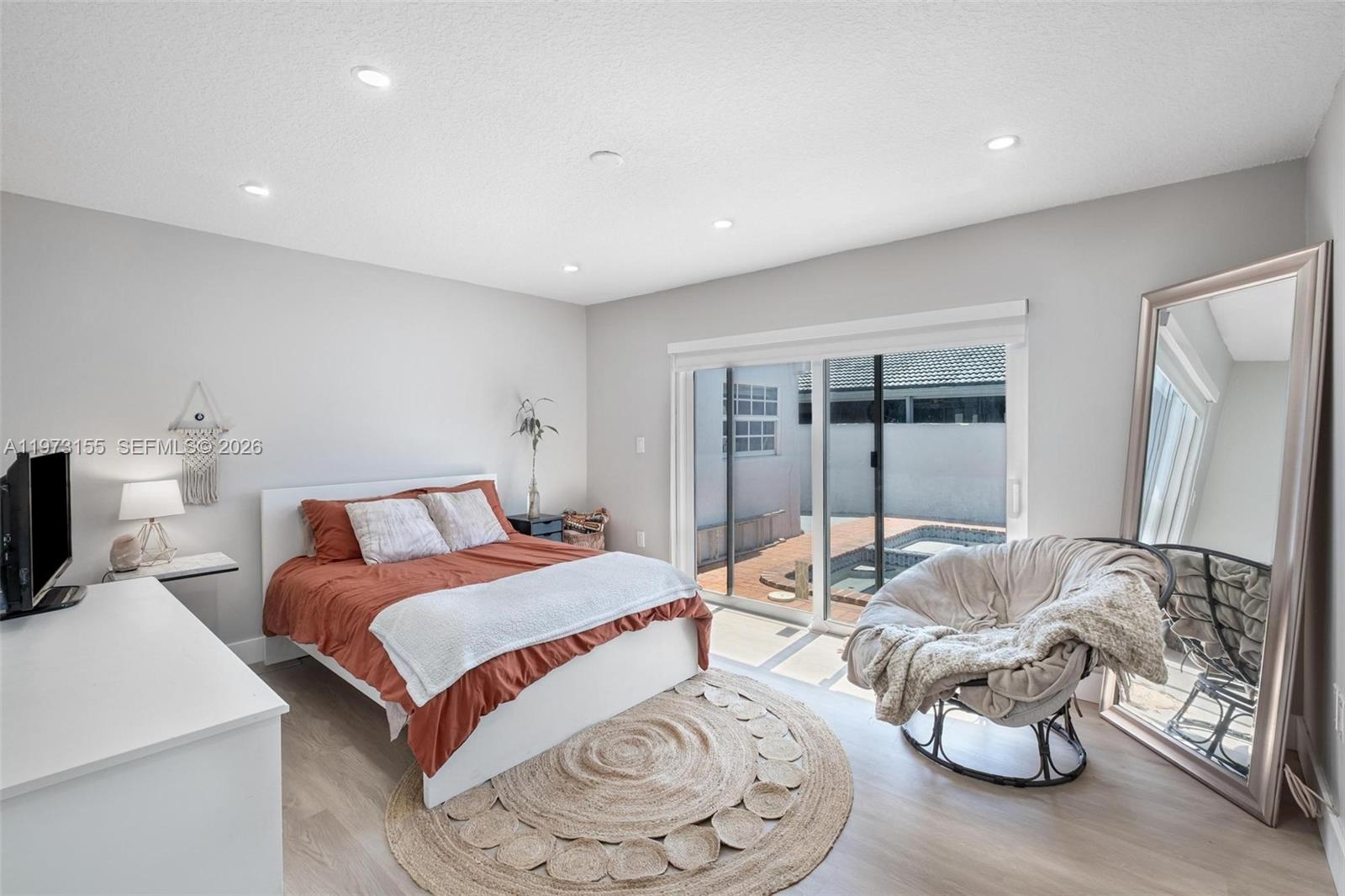 13710 Southwest 18th Terrace Miami, FL 33175 - Photo 13 of 46 a bedroom with furniture and a bed
