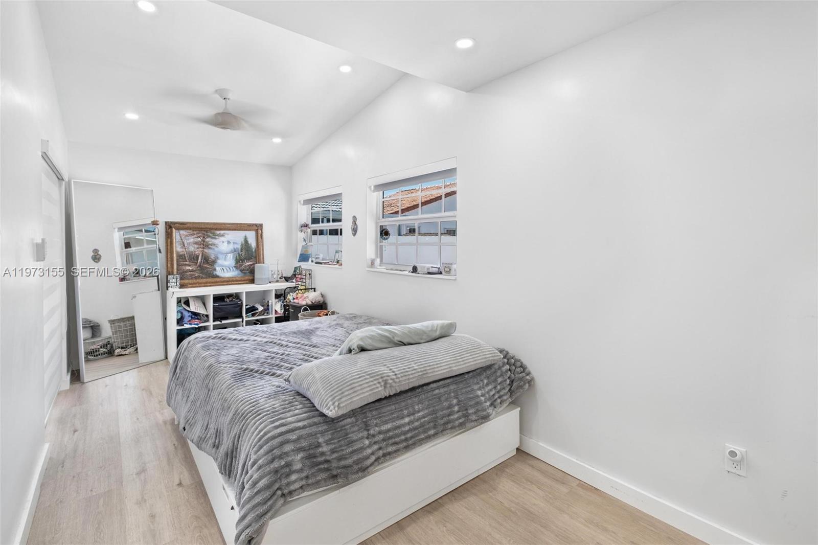 13710 Southwest 18th Terrace Miami, FL 33175 - Photo 15 of 46 a spacious bedroom with a bed and a view of bathroom