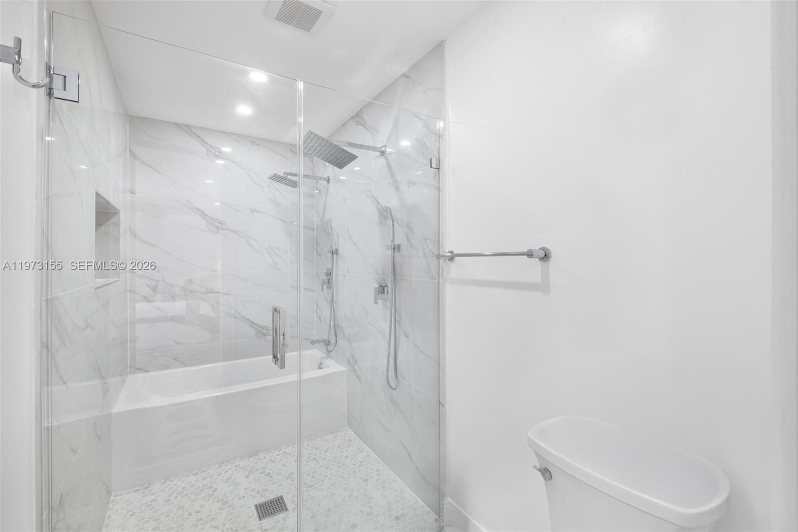 13710 Southwest 18th Terrace Miami, FL 33175 - Photo 17 of 46 a bathroom with a shower and toilet