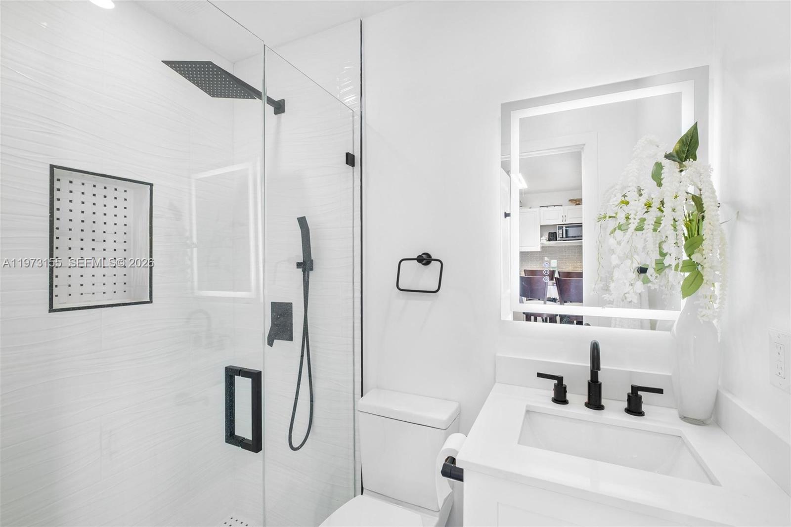 13710 Southwest 18th Terrace Miami, FL 33175 - Photo 21 of 46 a bathroom with a shower and a sink