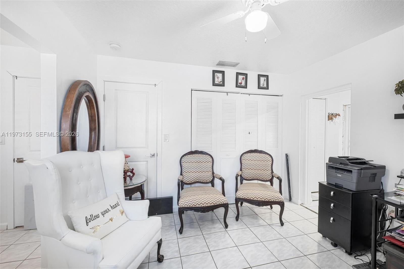 13710 Southwest 18th Terrace Miami, FL 33175 - Photo 25 of 46 a living room with furniture and window