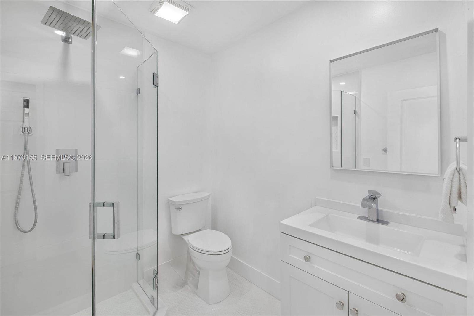 13710 Southwest 18th Terrace Miami, FL 33175 - Photo 27 of 46 a bathroom with a sink a toilet and shower