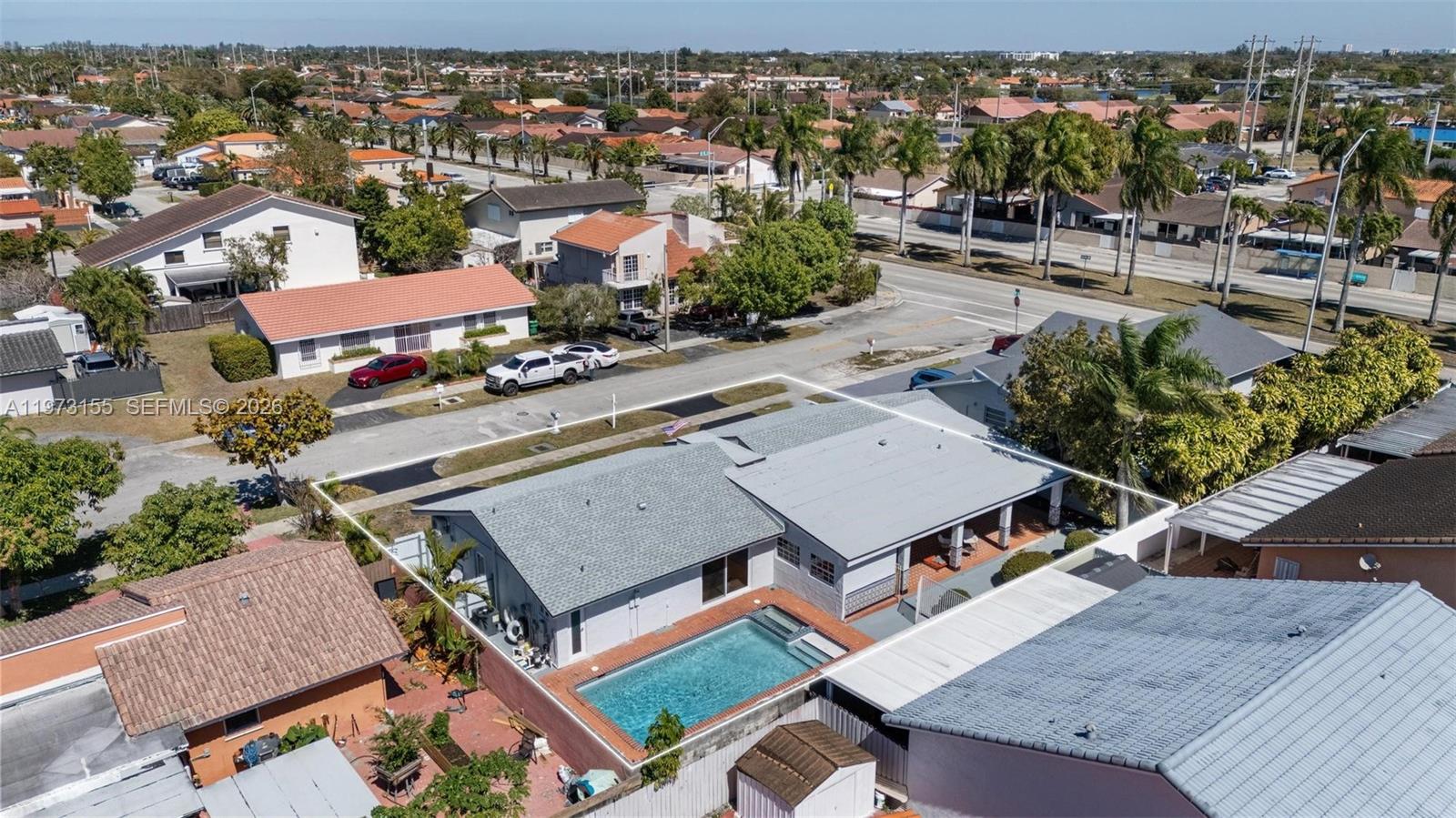 13710 Southwest 18th Terrace Miami, FL 33175 - Photo 39 of 46 an aerial view of a house with swimming pool and outdoor space