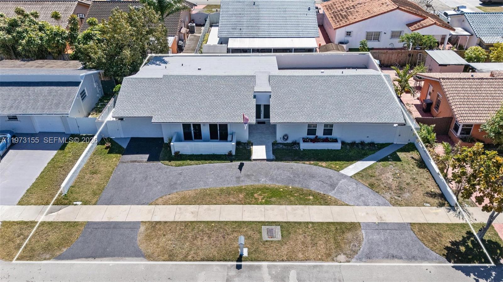13710 Southwest 18th Terrace Miami, FL 33175 - Photo 42 of 46 an aerial view of a house with swimming pool