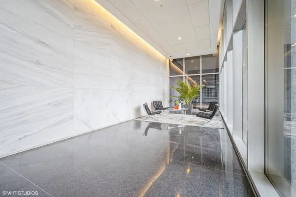 a kitchen with stainless steel appliances granite countertop a stove and a refrigerator