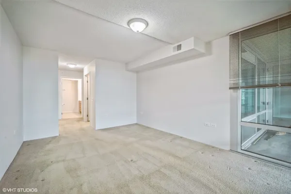 a bathroom with a double vanity sink mirror and toilet