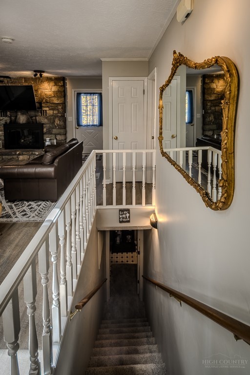 38 Rocky Meadows Road Newland, NC 28657 - Photo 26 of 50 a view of entryway and hall with wooden floor