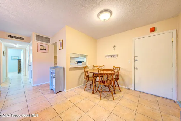 a view of a dining room with furniture