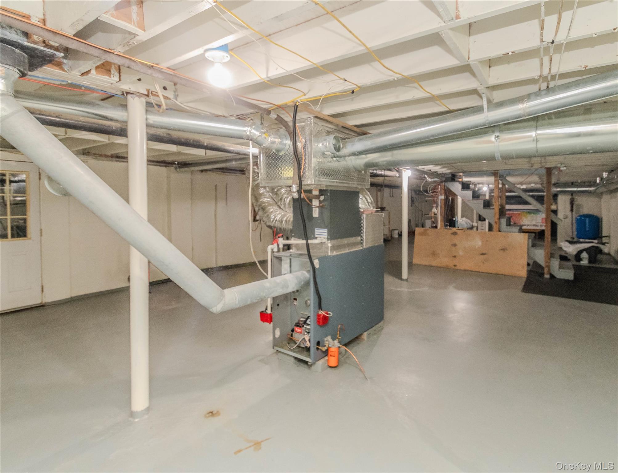 15 Van Dewark Road Middletown, NY 10941 - Photo 31 of 41 Utility room featuring a furnace system, exposed ductwork, and a painted concrete floor