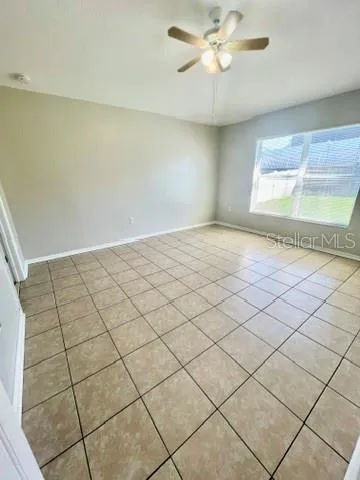 a view of an empty room and window