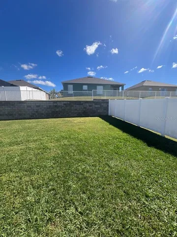 a view of outdoor space with a swimming pool