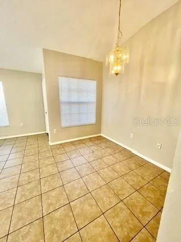 a view of a room with a bathroom