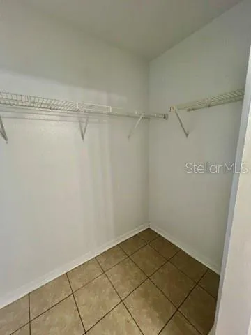 a view of a room that has a window in it