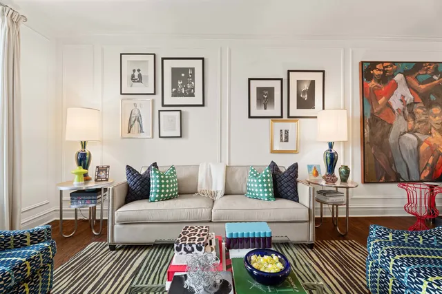 a living room with furniture and a rug