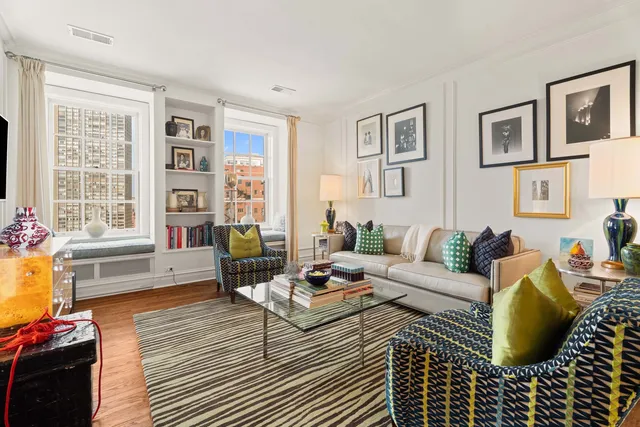 a living room with furniture or couch and a window